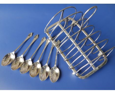 A Victorian silver six-division toast rack - Sheffield 1848 and a set of six silver coffee spoons - Sheffield 1936. (7) 