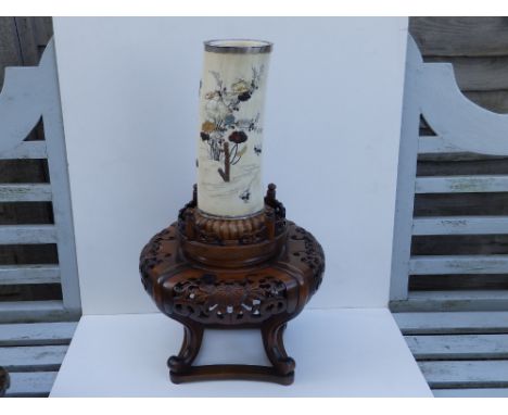 A signed Japanese Meiji period shibayama inlaid ivory tusk vase with silver rims, the sides decorated with mother-of-pearl, a