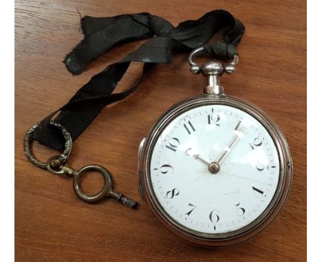 A Georgian silver pair cased pocket watch with dust cover to movement, London hallmarks for 1779.