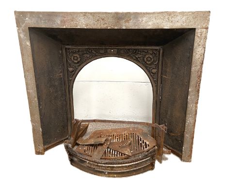 A cast iron coal fire surround and grate, with foliate cast corners and arched aperture