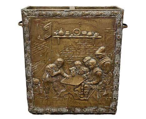 A vintage pressed brass two compartment stick stand, Continental circa 1900, with decorative figural scene