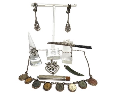Assorted novelty jewellery and virtu, including a cameo set bracelet, set with assorted masks, a Scottish silver Luckenbooth 