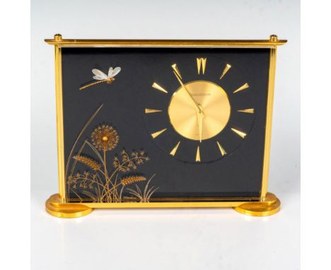A lucite and gilt brass decoration showing dragonfly amongst flowers. Eight day movement by Jaeger-LeCoultre with baton numer