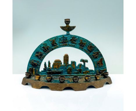 A blue and bronze colored menorah that has a flat base with 9 scones and an arch that depicts the different zodiacs. Made in 