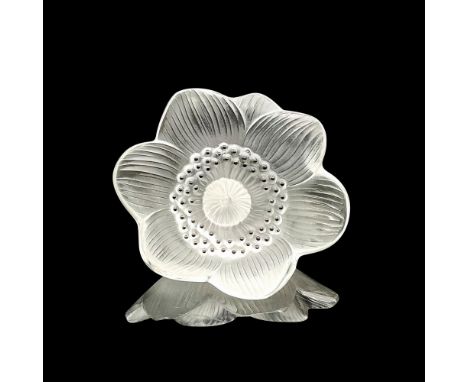 The Lalique Crystal Anemone Flower Sculpture, designed by the renowned crystal genius Rene Lalique, is a small, romantic, and