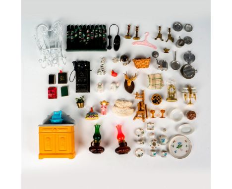 Large lot of miscellaneous doll house decorative items. Largest piece measures 3"L x 2"W x 4"H. Includes Avon bottle vanity w