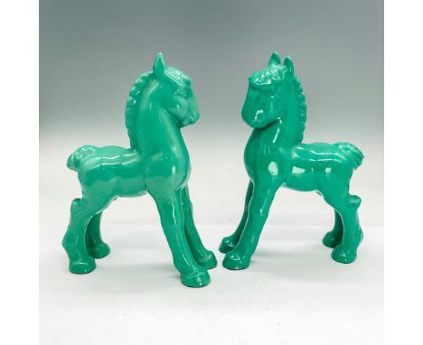 Two enamel on cast iron figures of standing ponies. Issued: Circa 1930Dimensions: 6"L x 2.5"W x 8.5"HCondition: Age related w