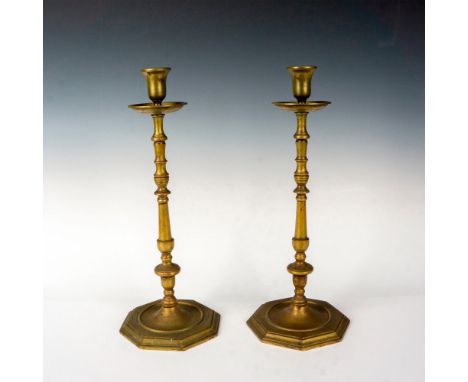 Tall brass candlestick holders with beautiful patina. England stamped on octagonal base. Dimensions: 6.25"L x 6.25"W x 16"HCo