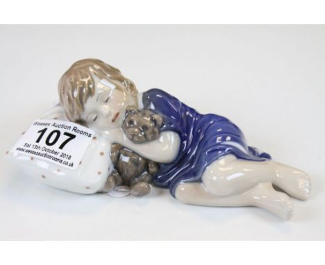 Royal Copenhagen ceramic model of a sleeping Child and numbered 675
