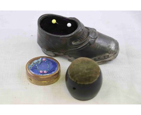 Ebony Pin Cushion, an Enamel Pill Box and a Pin Cushion in the shaped of a Clog