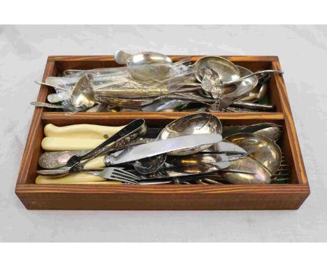 Tray of mixed EPNS flatware to include serving spoons, caddy spoon, sugar nips, knives forks and spoons, sifter spoons etc