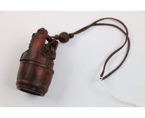 Carved hardwood netsuke in the form of two mice on top of a barrel, the barrel also acts as a container, height approximately