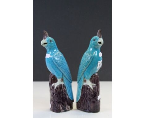 Pair of Oriental glazed ceramic Parrots with impressed marks to base