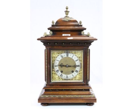 Key wind wooden cased "Ting Tang" Bracket Clock, with ornate metallic dial and gilt Brass detailing, the movement marked "RSM
