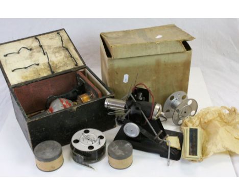 Boxed German Magic Lantern and a selection of Slides & a boxed film projector with several films