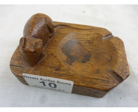 Robert 'Mouseman' Thompson of Kilburn: an oak ashtray of standard rectangular form with carved mouse signature, length approx