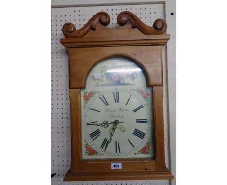 A modern waxed pine framed battery wall clock with longcase style arched dial marked for Duncan Hunter, Danbury