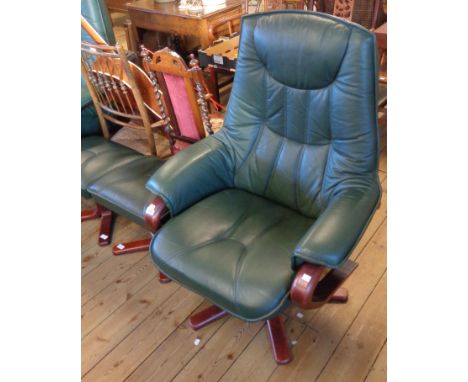 A modern reclining easy chair with polished bentwood frame and green leather upholstery - sold with a footstool to match