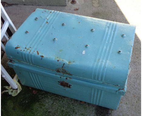 A painted metal trunk