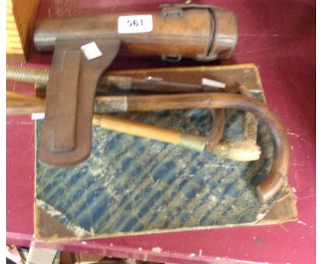 Assorted horn handled whips, walking cane, leather flask case and a horse book