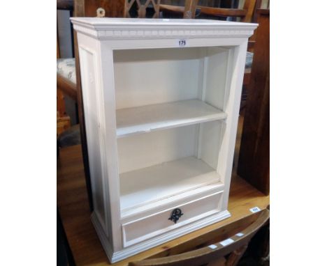 An 18" painted wood wall mounted shelf unit with drawer under