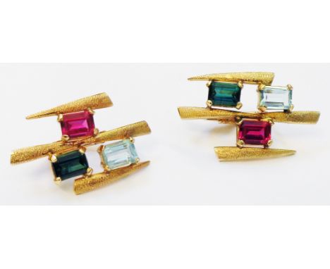 A pair of marked 18k yellow metal 1960`s style ear-rings, each set with emerald-cut synthetic ruby, blue tourmaline and aquam