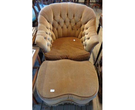 A 20th Century bedroom armchair upholstered in button back brown velour - sold with a foot stool to match