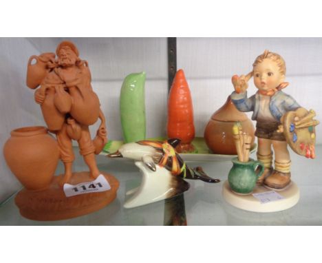 A Hummel figure The Artist, a Carlton Ware vegetable pattern cruet (cracked), a terracotta pot seller figure signed P. Grasso