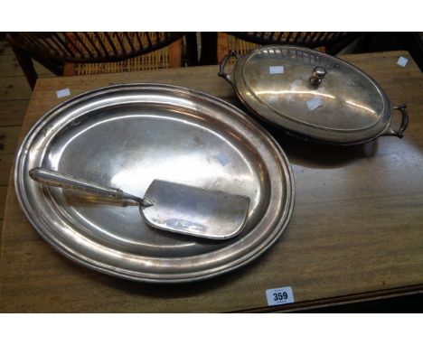 A silver plated oval tray, W.A.S. Benson vegetable dish with enamel lining and a crumb tray with decorative handle