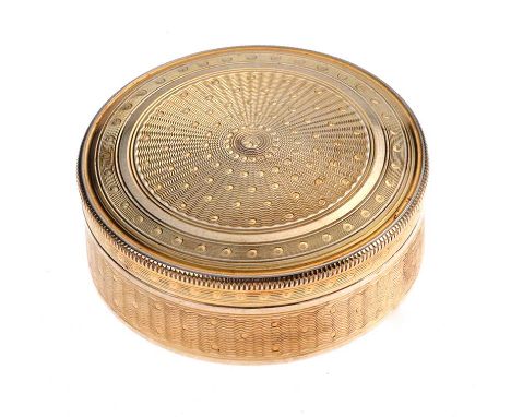 CONTINENTAL SILVER GILT CIRCULAR PILL BOX WITH AN ENGRAVED ENGINE TURNED LID AND SIDESMAKER: UNKNOWN DIAMETER: 2 INCHES HEIGH