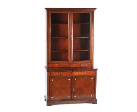 GLAZED MAHOGANY TWO DOOR BOOKCASE FITTED WITH FOUR DRAWERS, TOOLED LEATHER SLIDE AND TWO CUPBOARDS BELOW, ON BRACKET FEET HEI