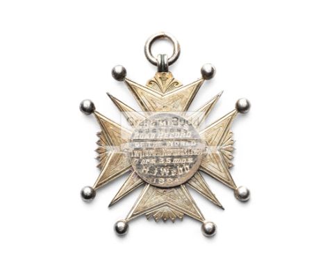 Gold-mounted silver medal for a 100 mile world road cycling record set in 1884 by Henry John Webb, an English scholar, cousin