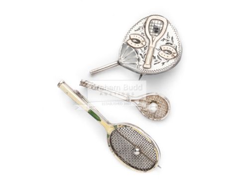A Victorian fan shaped brooch in silver, with gold tennis racquet and horseshoe relief,hallmarked Birmingham 1889; sold toget