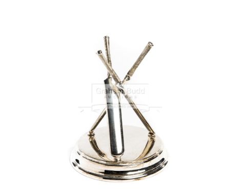 A Victorian silver plated cricket novelty,designed as a tripod formed with model cricket bats, on a stepped circular base, he
