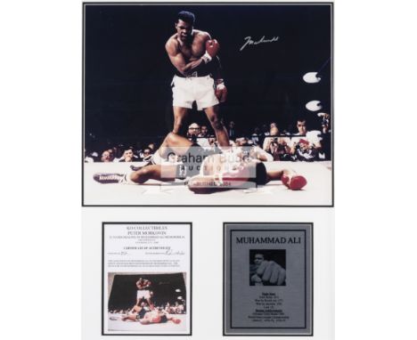 Muhammad Ali signed photographic framed display,comprising a large 16 by 20in. colour photograph of the 'phantom punch' v Son