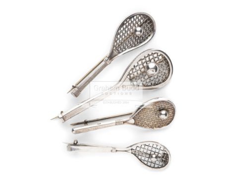 Four Victorian silver tilt head tennis racquet brooches, each with a tennis ball on the stringing, in associated box, longest