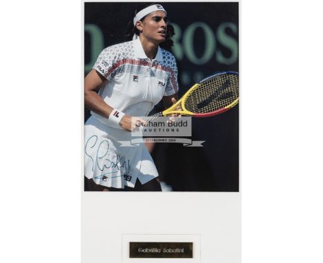 A collection of Tennis posters,comprising an autographed Gabriela Sabatini photograph, signed in green fine marker pen, mount