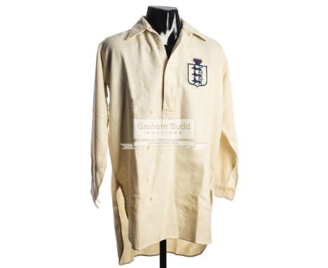 A Frank Roberts white England international football shirt season 1924-25,woollen button-up 16in. neck long-sleeved shirt wit