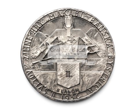 1936 Second Maccabiah Winter Games 2nd place prize medal for slalom,silver, obverse with stylized figure wearing the Maccabia