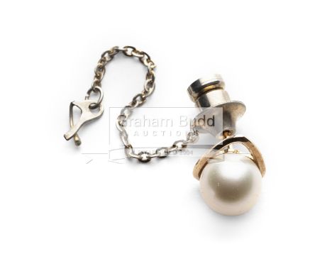 A 14k continental gold & pearl tie pin formerly owned by Keith PiggottThis item is believed to have been a prize from a race 