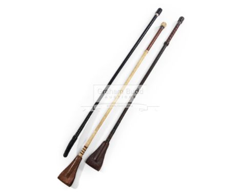 Three racing whips used by jockey Edward Hide during his career,comprising a Hermes Paris white herringbone pattern whip with