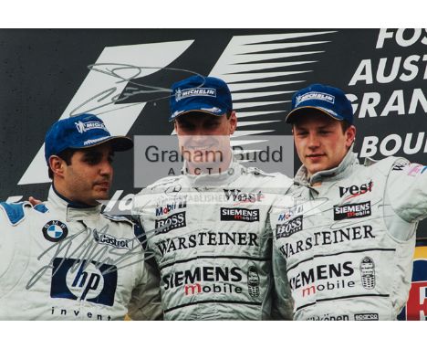 2003 Australian Grand Prix triple-signed race podium photograph,the signatures of winner David Coulthard, second placed Juan 