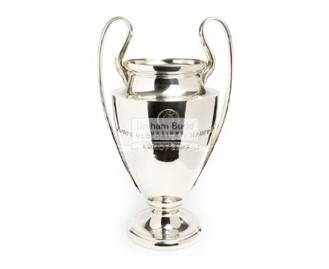 A UEFA Champions League Replica trophythe silver-plated twin handled baluster trophy cup with circular base, the body UEFA ap