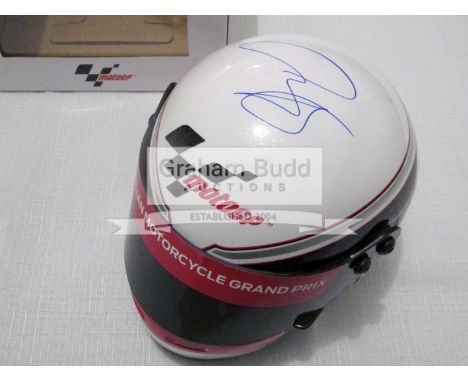 A group of six signed MotoGP caps & a ½ Scale Moto GP Helmet (Australian Moto GP),caps signed respectively by Jorge Lorenzo &