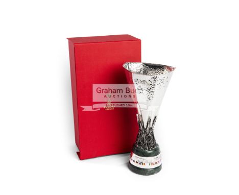 A replica Sevilla CF UEFA Europa League Champions Commemorative trophy,the silver-plated scale replica of the tournament trop