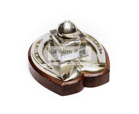 An Edwardian silver-plated novelty inkstand with a design incorporating a jockey cap and horse shoe,by Daniel & Arter, 1909 R