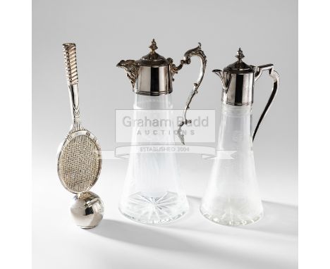 Two Victorian silver-plated glass tennis related Claret jugs,the first etched with a Lady tennis player, 28.5 cm high and the