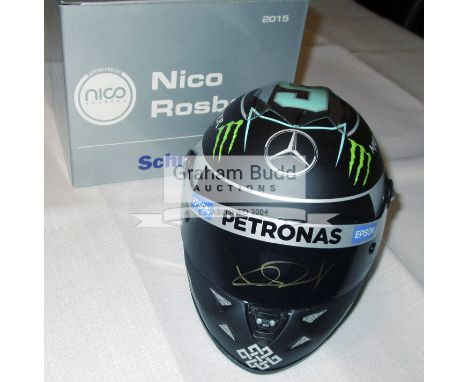 Nico Rosberg signed F1 memorabilia,comprising a signed Mercedes 2015 F1 mini helmet 1:2 scale, signed to the visor in gold ma