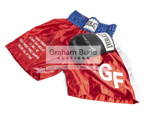 George Foreman signed trunks and Jake LaMotta signed glove,the red & blue Everlast trunks inscribed "George Foreman, Olympic 
