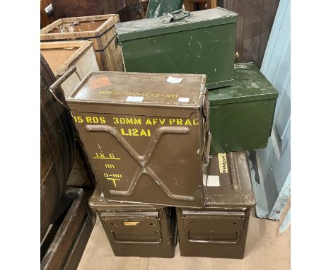 Five vintage metal military issue boxes 